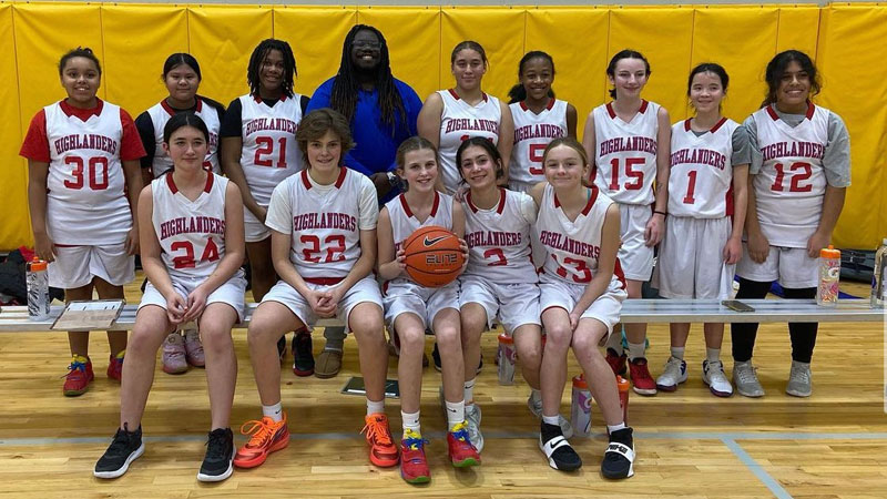Middle Grades Girls Basketball Team photo on court