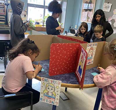 photo of students voting in the classroom