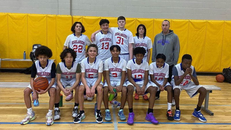 Middle Grades Boys Basketball Team photo on court