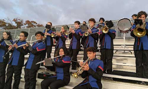 SHS band plays on bleachers